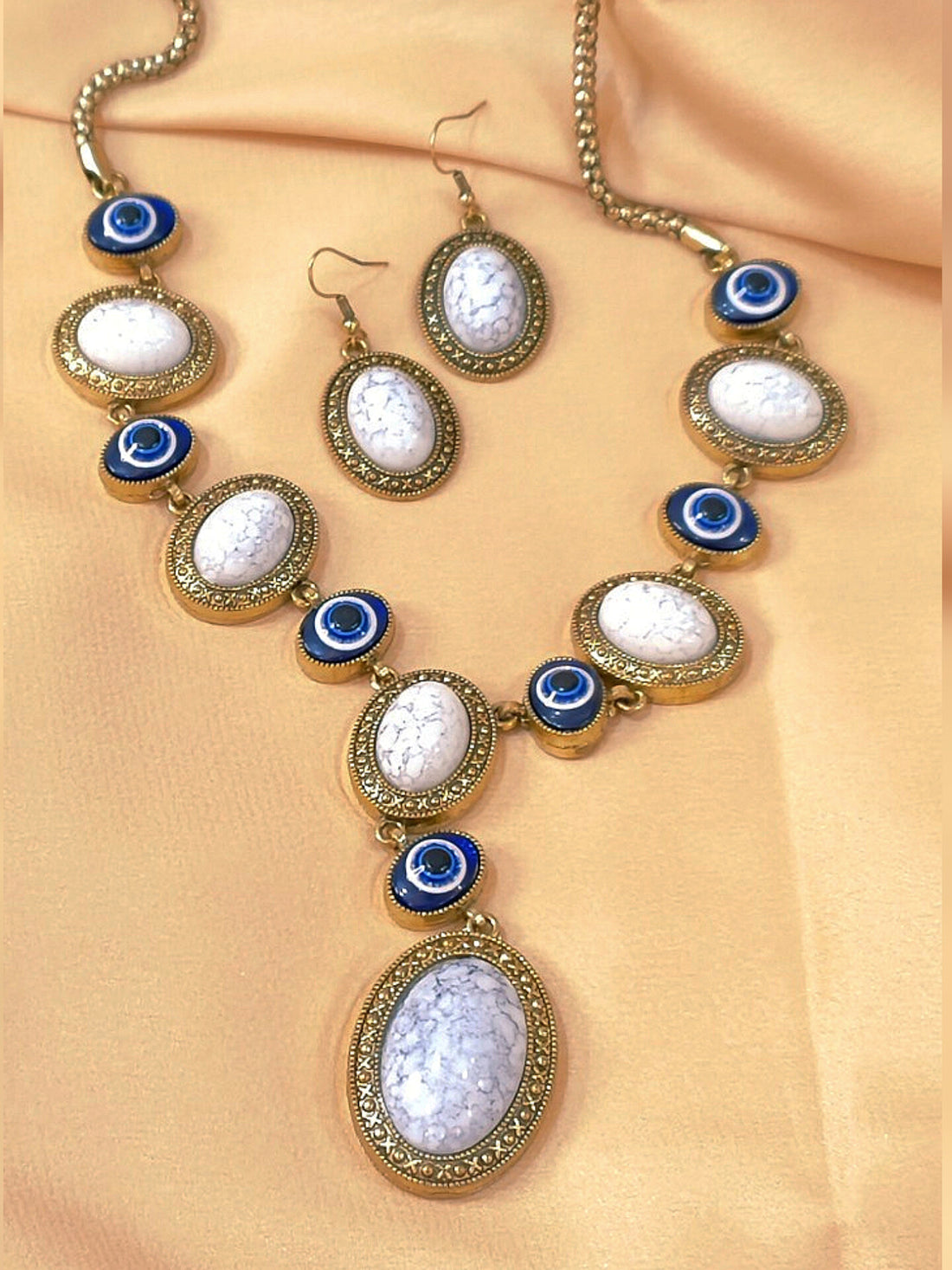 Gauhar Metallic Necklace set with Evil Eye Design from Mrigaya by Nandini - White Silver