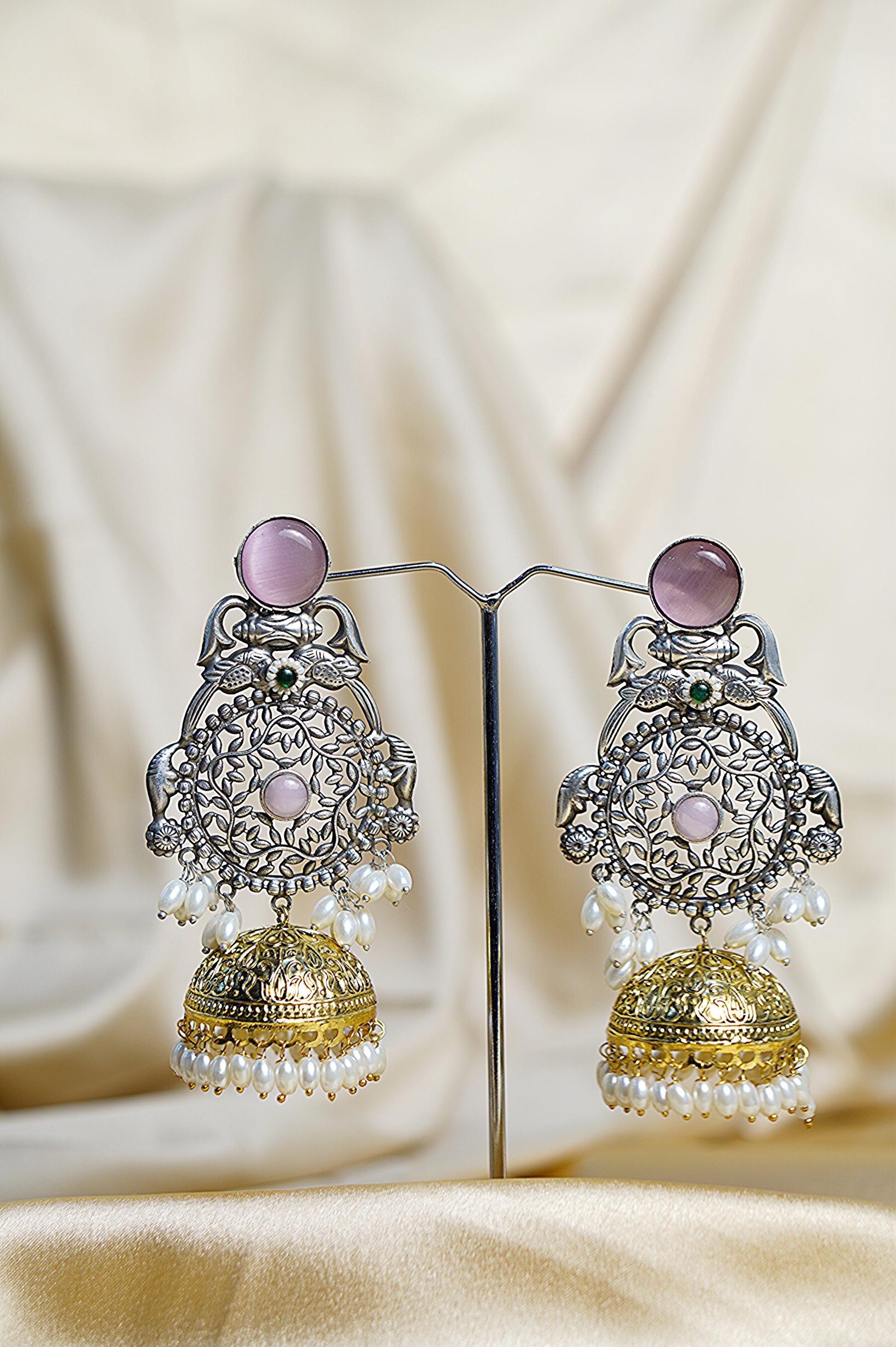 Sitara _Light Weight Heavy-Look Jhumka Collection - Artificial Silver Finish earrings
